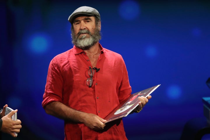 French former soccer star Eric Cantona receives the UEFA President's Award during the Champions League group stage draw at the Grimaldi Forum, in Monaco.