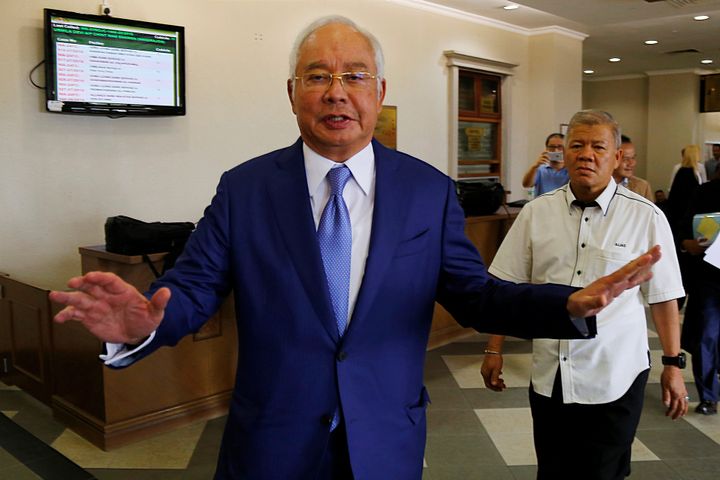 Former Malaysian Prime Minister Najib Razak gestures during a break at Kuala Lumpur High Court in Kuala Lumpur, Malaysia August 28.
