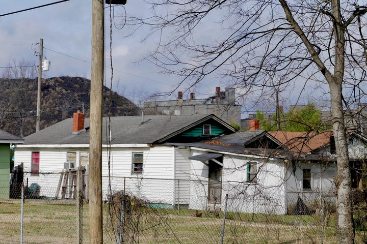 The view from the alley behind activist Keisha Brown's street where mounds of industrial waste obstruct the view of the coke