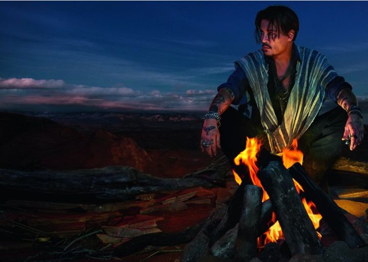 A promotional still for the fragrance "Sauvage" featuring actor Johnny Depp. 