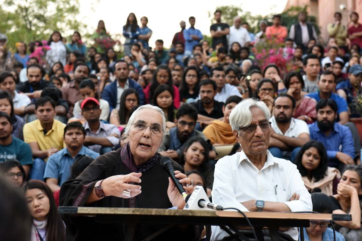 NEW DELHI, INDIA - MARCH 6: Historian Romila Thapar and Harbans Mukhia addressing students at Jawaharlal Nehru University (JNU) Campus on March 6, 2016 in New Delhi, India. Thapar said that it will be difficult for the government to 'control' the thinking process unless it turns into a totally "anti-democratic dictatorship". She told "JNU is not likely to suffer a setback as there is much intellectual support for it in the country. There are other universities too that discuss a range of ideas as are discussed in the JNU. The existence of a varsity is intended for that to discuss ideas of every kind." (Photo by Sushil Kumar/Hindustan Times via Getty Images)