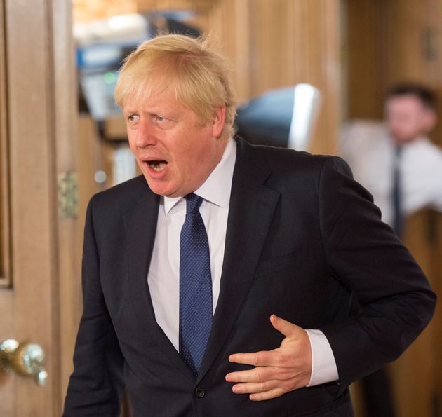 British Prime Minister Boris Johnson gestures as he answers questions from children aged 9-14 during an education announcement inside Downing Street in London, Britain, August 30, 2019. Jeremy Selwyn/Pool via REUTERS