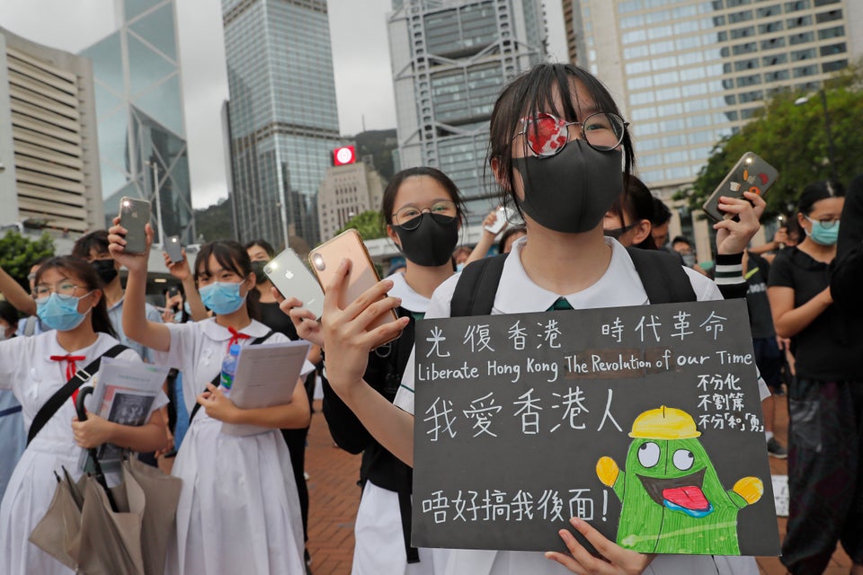A student wears an eye patch to show solidarity with a woman injured by a police projectile during a...