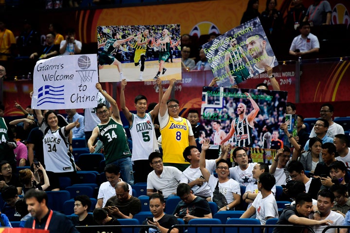 Fans of the Greece basketball team cheer during the Basketball World Cup Group F game between Brazil and Greece in Nanjing on September 3, 2019. (Photo by WANG Zhao / AFP) (Photo credit should read WANG ZHAO/AFP/Getty Images)