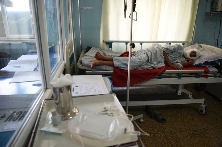 A wounded man lies in bed after being treated at Wazir Akbar Khan hospital after a massive explosion the night before in Kabul on September 3, 2019. - A massive explosion rocked central Kabul late on September 2, killing at least five people in a Taliban-claimed attack near an international complex while the US special envoy leading talks with the insurgents visited the Afghan capital. (Photo by WAKIL KOHSAR / AFP) (Photo credit should read WAKIL KOHSAR/AFP/Getty Images)