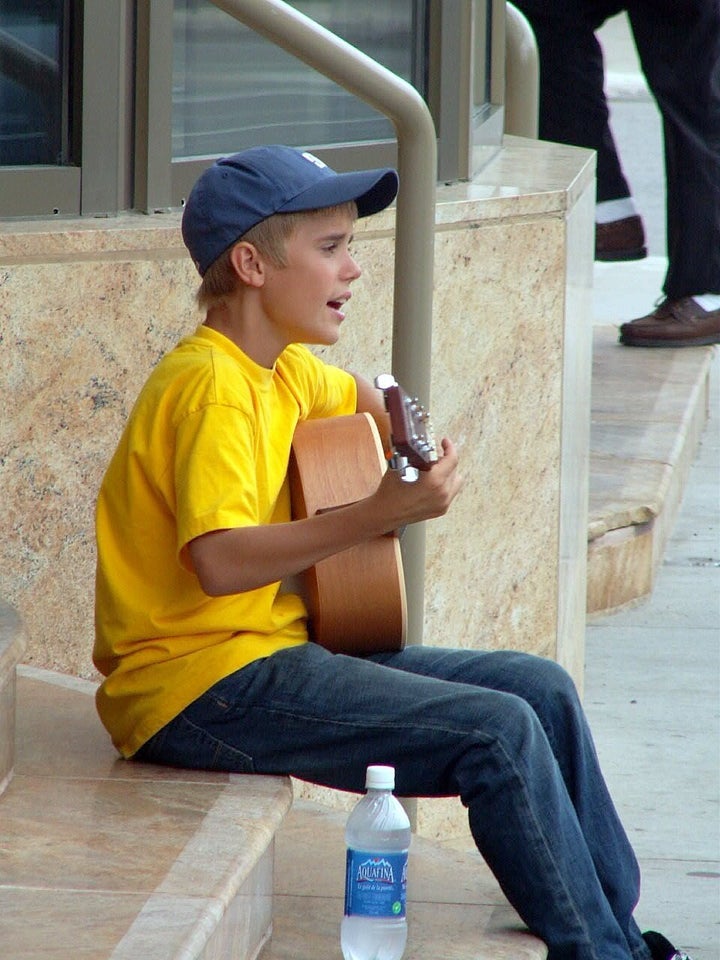 A 13-year-old Justin Bieber busking on the street in Stratford, Ont. on Aug. 20, 2007. His hometown now has a museum devoted to the singer.