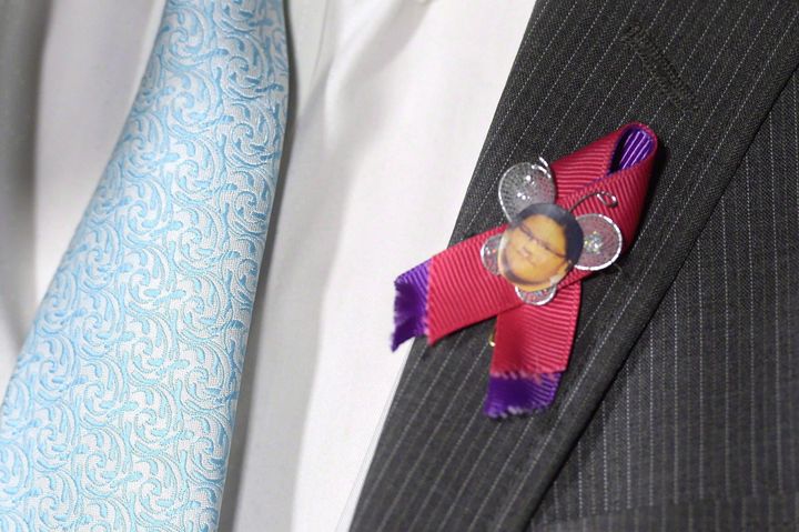 NDP MP Charlie Angus wears a pin honouring Sheridan Hookimaw, a 13-year-old girl who committed suicide on the Attawapiskat First Nation.