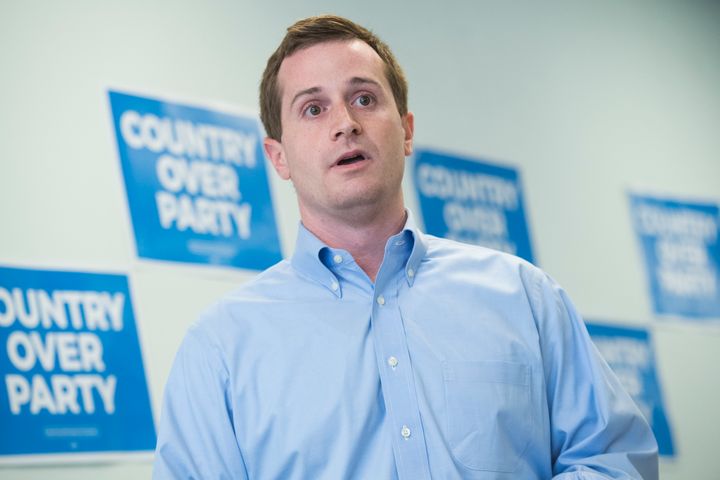 Dan McCready, Democratic candidate for North Carolina's 9th District, talks with voters at his campaign office during his education tour in Elizabethtown, North Carolina, in August.