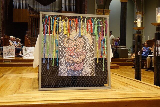 Kelly Latimore's icon is titled "Mother of God: Protectress of the Oppressed." It is seen here in front of the altar at St. Mary’s Church in Newark.
