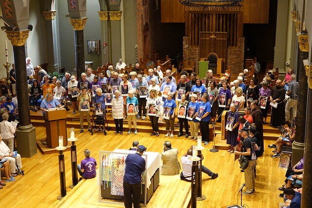 Catholics gather at St. Mary’s Church in Newark, New Jersey, for a meeting before marching to the city’s Federal Building.