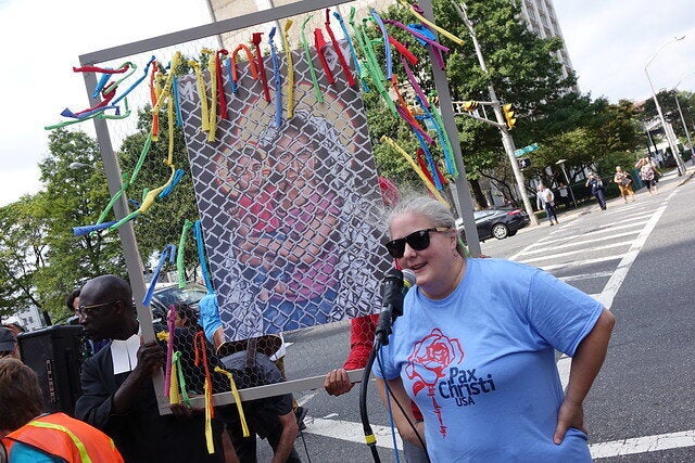 Kathy O’Leary, a New Jersey region coordinator for Pax Christi USA, speaks at a protest outside Newark's Federal Building.