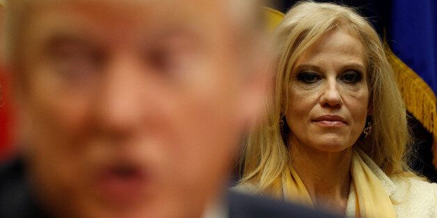 White House advisor Kellyanne Conway listens as U.S. President Donald Trump meets with county sheriffs...