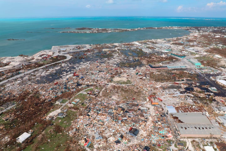 The destruction caused by Hurricane Dorian is seen from the air, in Marsh Harbor, Abaco Island, Bahamas, Wednesday, Sept. 4, 2019. The death toll from Hurricane Dorian has climbed to 20. Bahamian Health Minister Duane Sands released the figure Wednesday evening and warned that more fatalities were likely. (AP Photo/Gonzalo Gaudenzi)