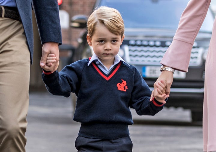 A solemn Prince George of Cambridge arrives for his first day of school at Thomas's Battersea on Sept. 7, 2017.