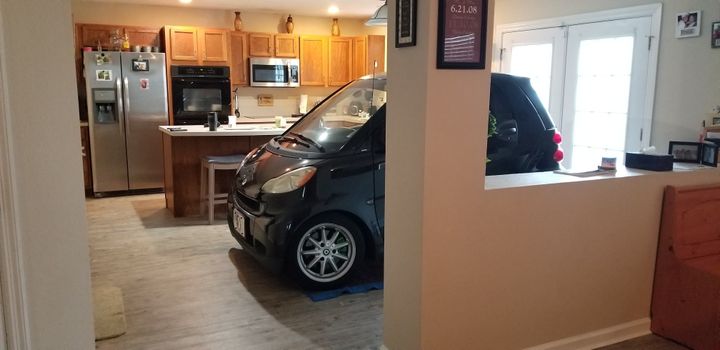 Florida Man Parks Smart Car In Kitchen