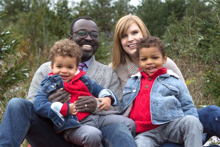 Palmer's eldest son is already aware that his mom is white and his dad is black, but he's still learning exactly what that means. (Pictured: Casey Palmer with his wife and kids)