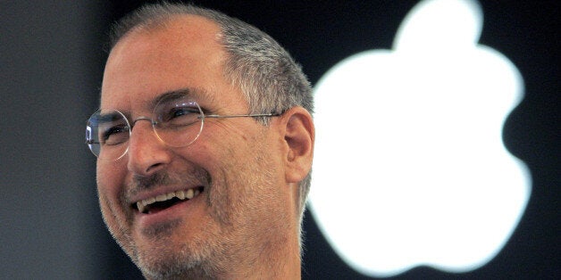FILE - In this Sept. 20, 2005 file photo, Apple co-founder Steve Jobs smiles after a press conference...