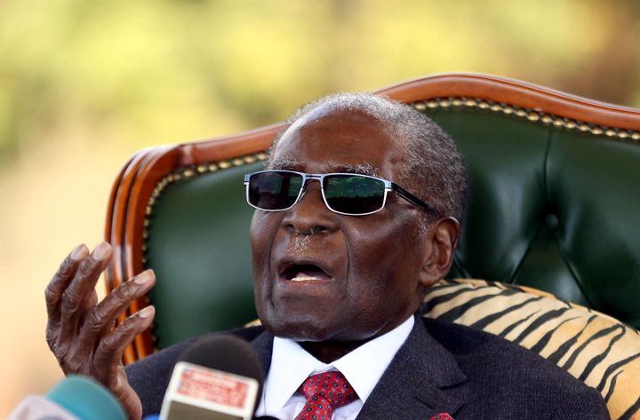 Zimbabwe's former president Robert Mugabe gestures during a news conference at his private residence nicknamed "Blue Roof" in Harare, Zimbabwe, July 29, 2018. 