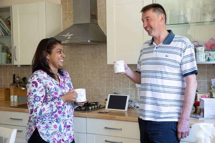 Robert and neighbour Dorinda, who nominated him for the award.