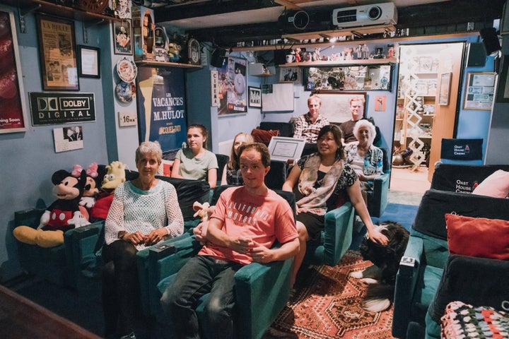 Olga (left) and Wayne (right) on the front row of their home cinema.