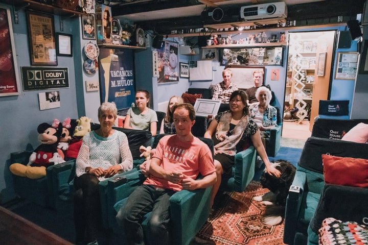 Olga (left) and Wayne (right) on the front row of their home cinema. 