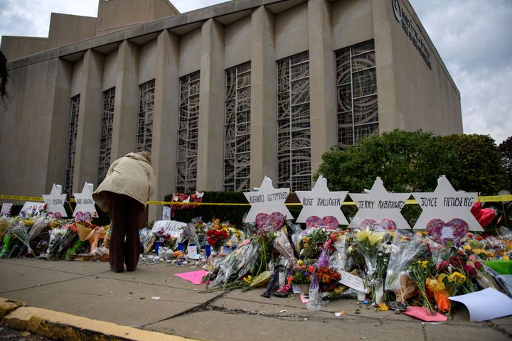 Mourners visit the memorial outside the Tree of Life Synagogue on October 31, 2018 in Pittsburgh, Pennsylvania. 
