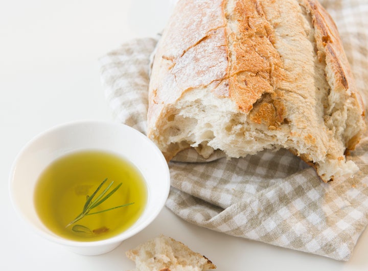 Whole grain bread is allowed on the Mediterranean diet -- just make sure you eat it with olive oil instead of butter.