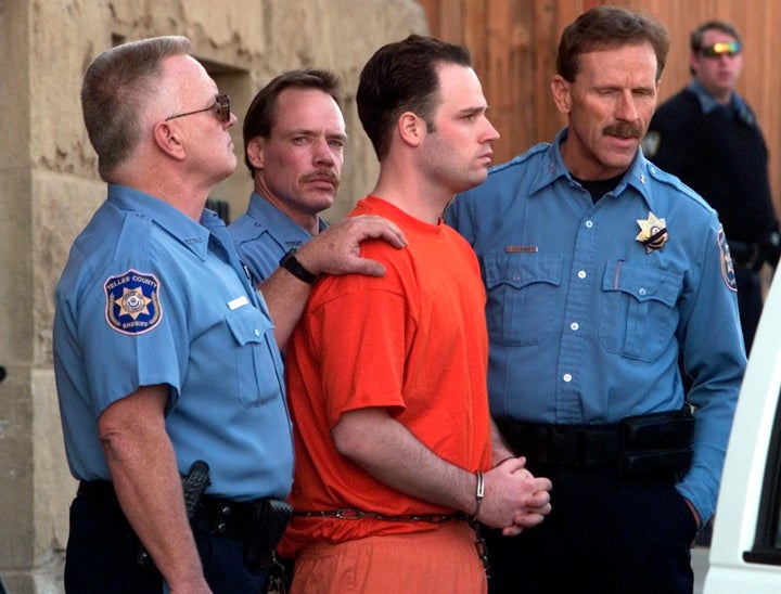 Randy Halprin, one of the Texas 7 prison escapees, is led out of the Teller County Courthouse after an extradition hearing in Cripple Creek, Colorado, on Jan. 26, 2001.