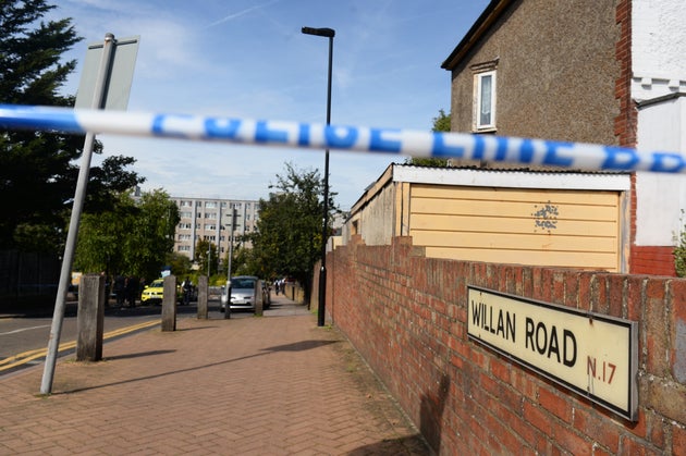 A police cordon in place in Willan Road on the Broadwater Farm Estate in Tottenham, London, where a boy was rushed to hospital after being found with stab wounds.