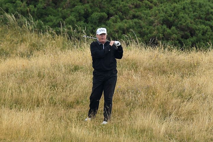 TURNBERRY, SCOTLAND - JULY 15: U.S. President Donald Trump plays a round of golf at Trump Turnberry Luxury Collection Resort during the U.S. President's first official visit to the United Kingdom on July 15, 2018 in Turnberry, Scotland.