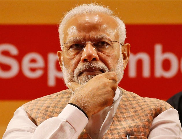 Indian Prime Minister Narendra Modi attends the inauguration of the first coach for Mumbai Metro built...
