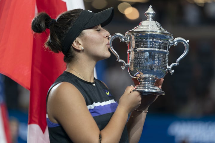 Andreescu poses with her trophy after beating Serena Williams on Saturday.
