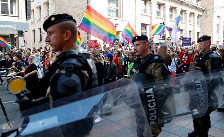 Policemen guard the country's first ever LGBT pride parade in downtown Sarajevo, Bosnia-Herzegovina, Sunday, Sept. 8, 2019. S
