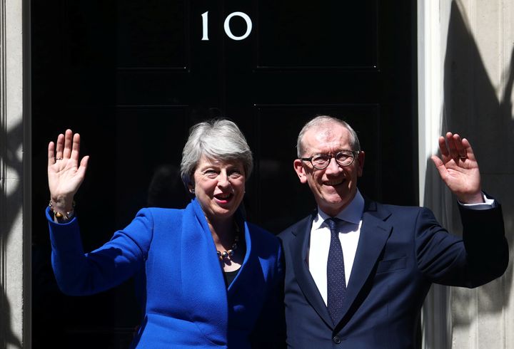 Theresa May and her husband Philip outside Number 10 on her last day acting as prime minister 