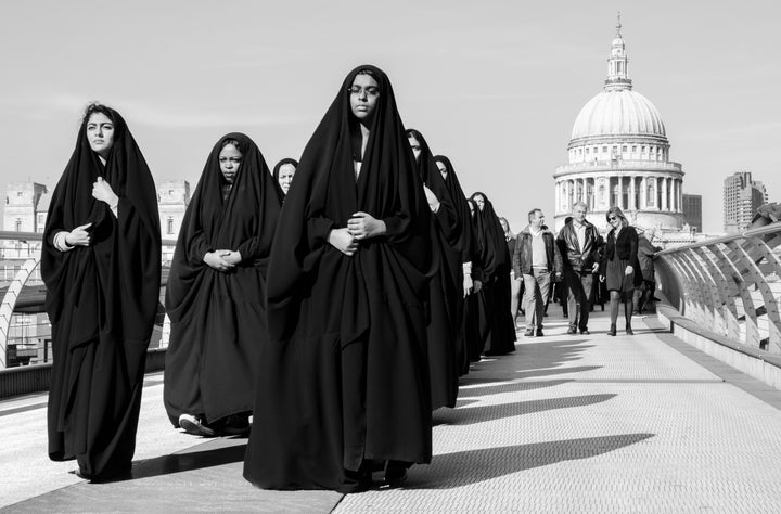 "International Women's Day, captured in passing on the Millennium bridge."