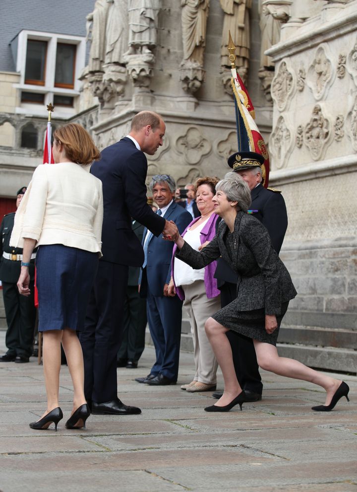 Theresa May greets Prince William in 2018