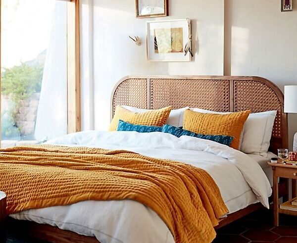 Ochre-colored bedding is a great way to bring this trend to your home. 