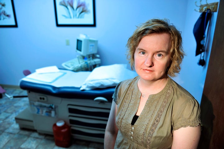 Tammi Kromenaker, director of the Red River Women's Clinic, poses for a photograph in Fargo, North Dakota on July 2, 2013. Th
