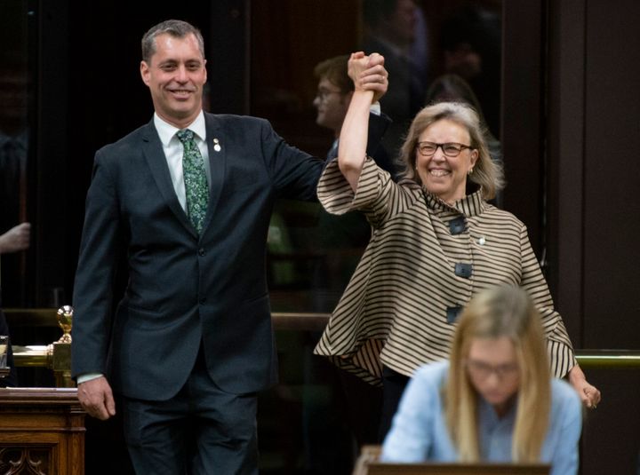 Green Party Leader Elizabeth May enters the House of Commons with the newly sworn in MP Paul Manly before question period on May 27, 2019.