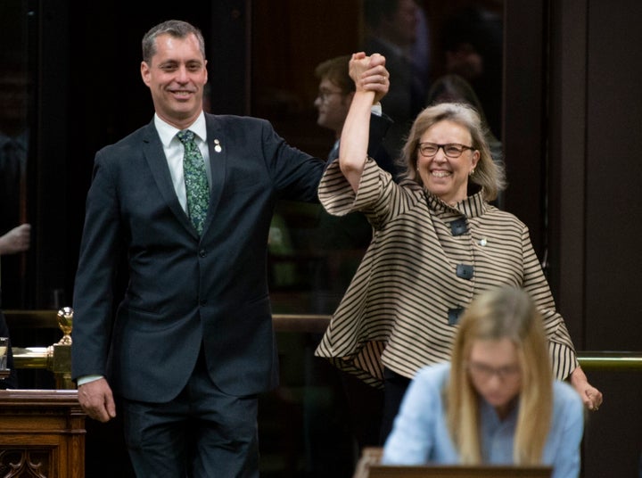 Green Party Leader Elizabeth May enters the House of Commons with the newly sworn in MP Paul Manly before question period on May 27, 2019.