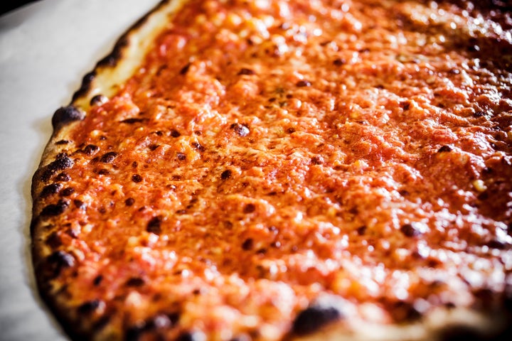 In Connecticut, the New Haven-style pie was made famous by Frank Pepe Pizzeria Napoletana, whose pizza is seen here.