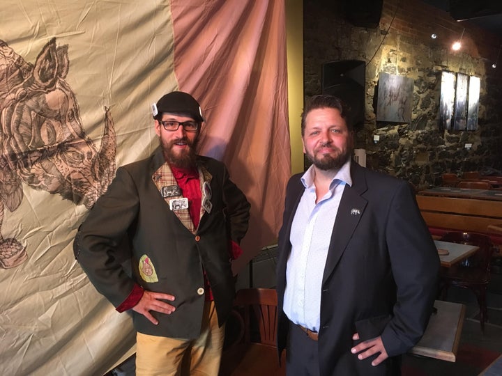 Rhinoceros Party Leader Sébastien CoRhino, left, is seen with the party's candidate Maxime Bernier.