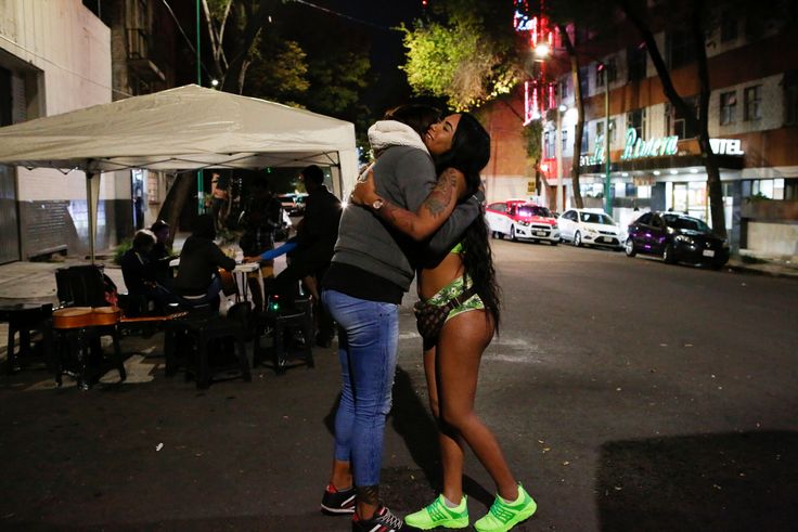 Trans rights activist Kenya Cuevas embraces Angie, a 20-year-old transgender sex worker, in Mexico City. 