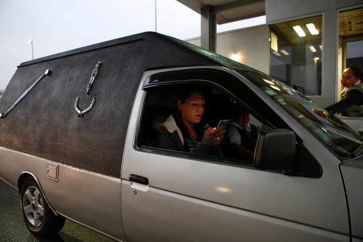 In the annual Pride parade this June, Cuevas road on top of the hearse to call attention to the violence her community continues to suffer. (AP Photo/Ginnette Riquelme)