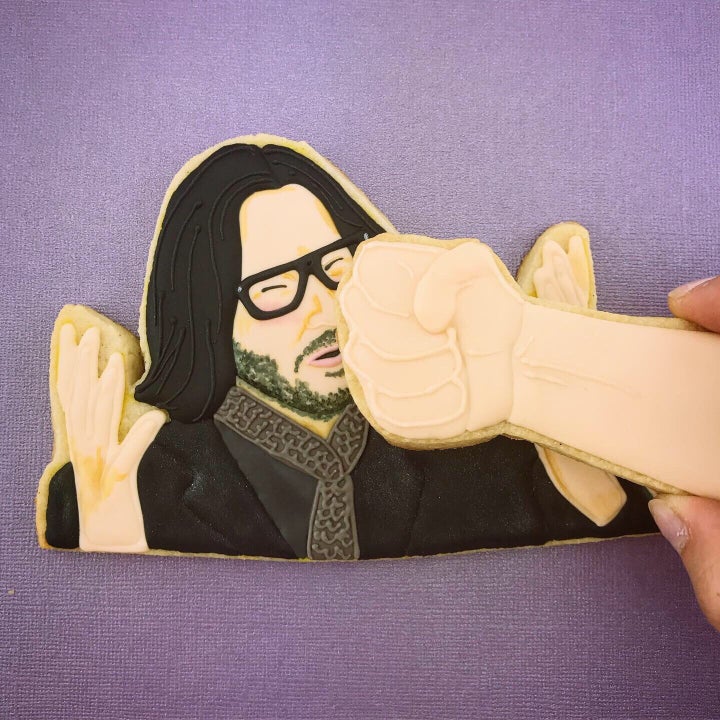 Keanu Reeves get punched, in cookie form.