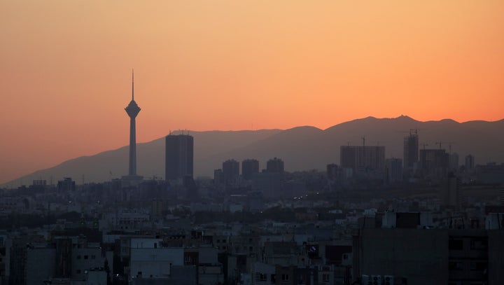 Milad telecommunications tower, left, and buildings are seen at sunset in Tehran, Iran, Monday, Aug. 19, 2019. (AP Photo/Vahid Salemi)