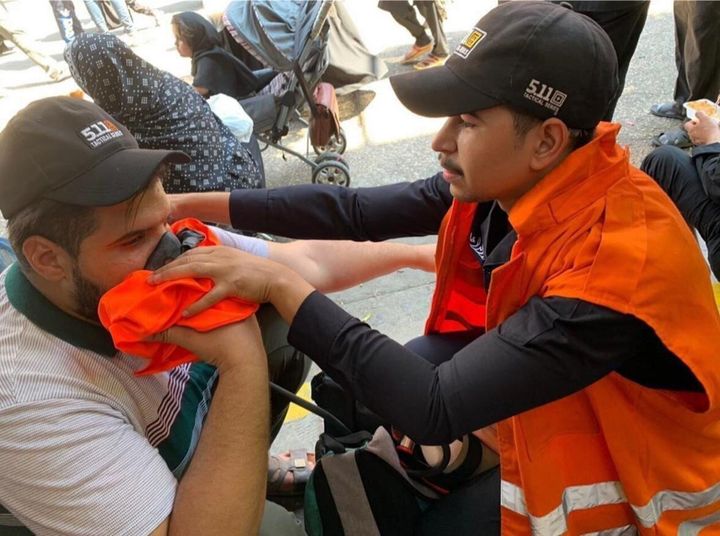 KARBALA, IRAQ - SEPTEMBER 10: People, affected from the stampede, receives medical attention from Iraqi health team, on September 10, 2019 in Karbala, Iraq.