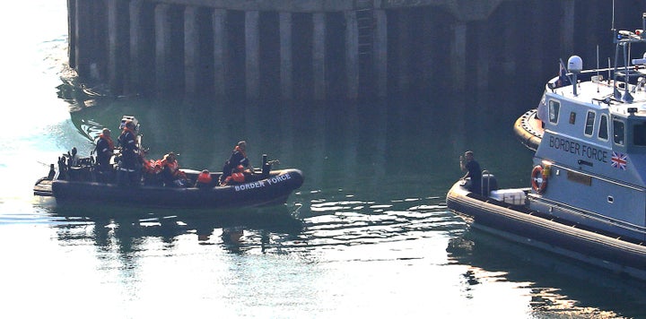 A group of people thought to be migrants are brought to the Port of Dover by Border Force officers after they were intercepted in the Channel in dinghies earlier this morning. (Photo by Gareth Fuller/PA Images via Getty Images)