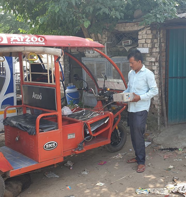 Baijnath is charging his e-rickshaw batteries at an unauthorised charging station at NAC Mani Majra in Chandigarh. 