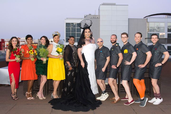 James Hilton Harrell (center) appearing as their drag alter ego, Diane A. Lone, at the wedding along with the full bridal party.